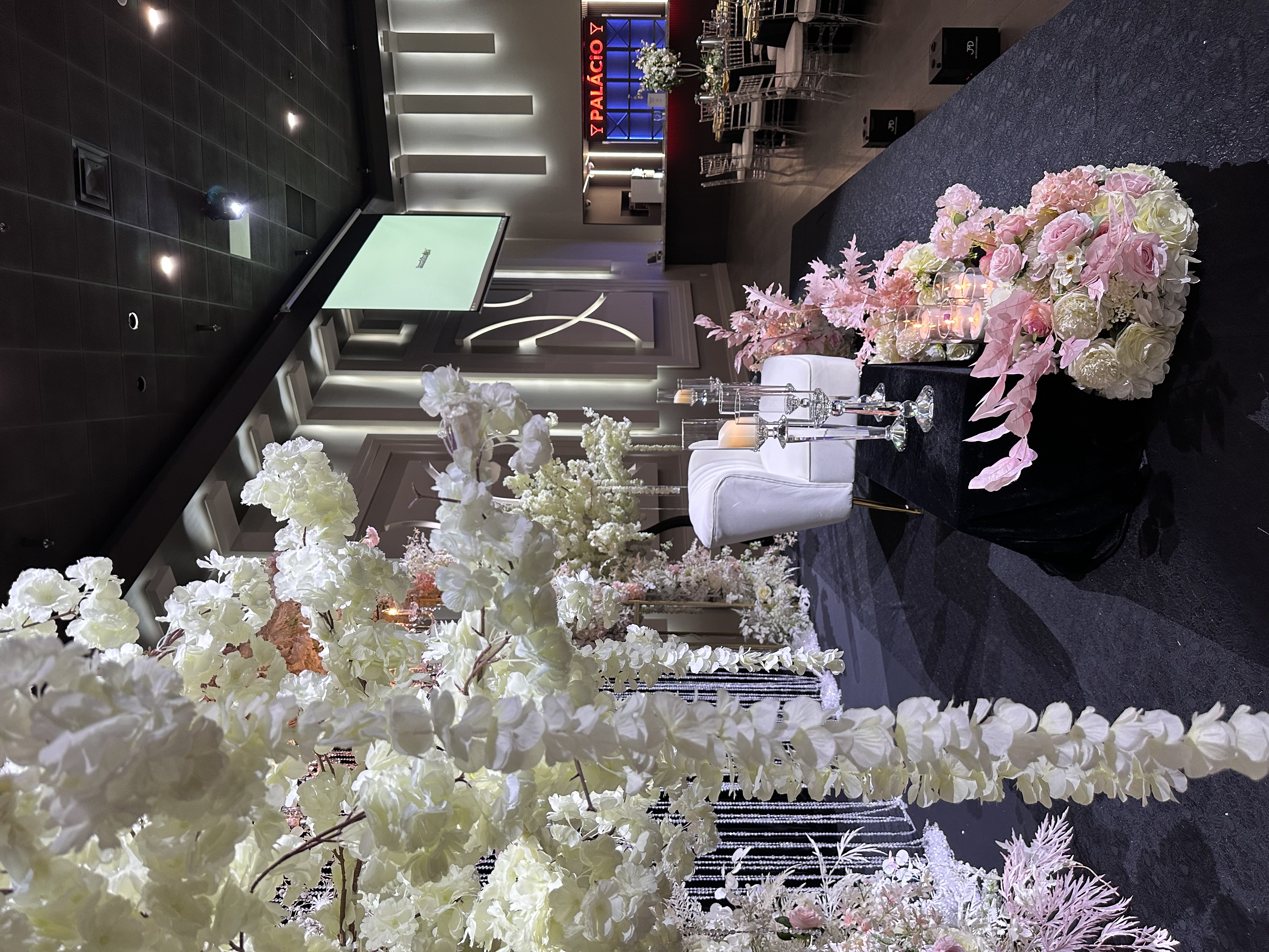 Corporate gala-style event setup at Palacio Event Centre with elegant tables and stage decor